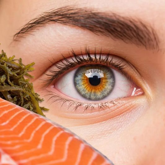 Close-up of a healthy eye with natural sources of astaxanthin like salmon and microalgae, emphasizing eye health benefits